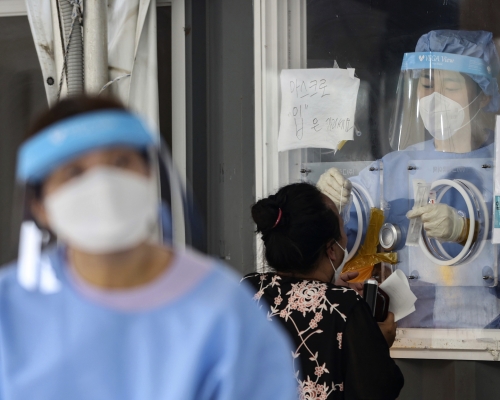 南韓周日新增1,556宗新冠肺炎確診病例。美聯社圖片