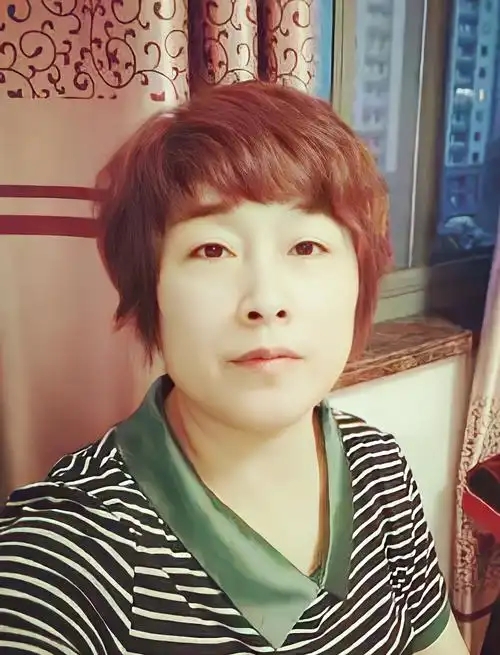 許國利妻子來惠利。