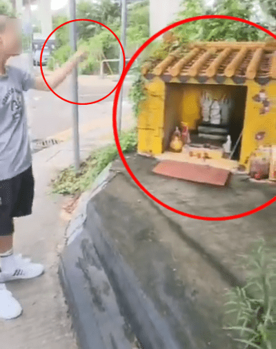 另一段影片少年走到路邊一座小廟。