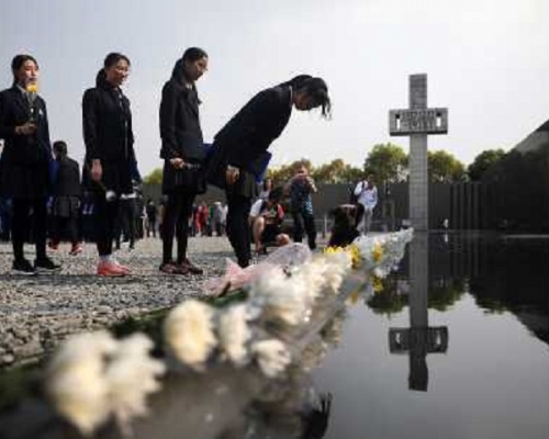 內地學生出席南京大屠殺悼念活動。資料圖片
