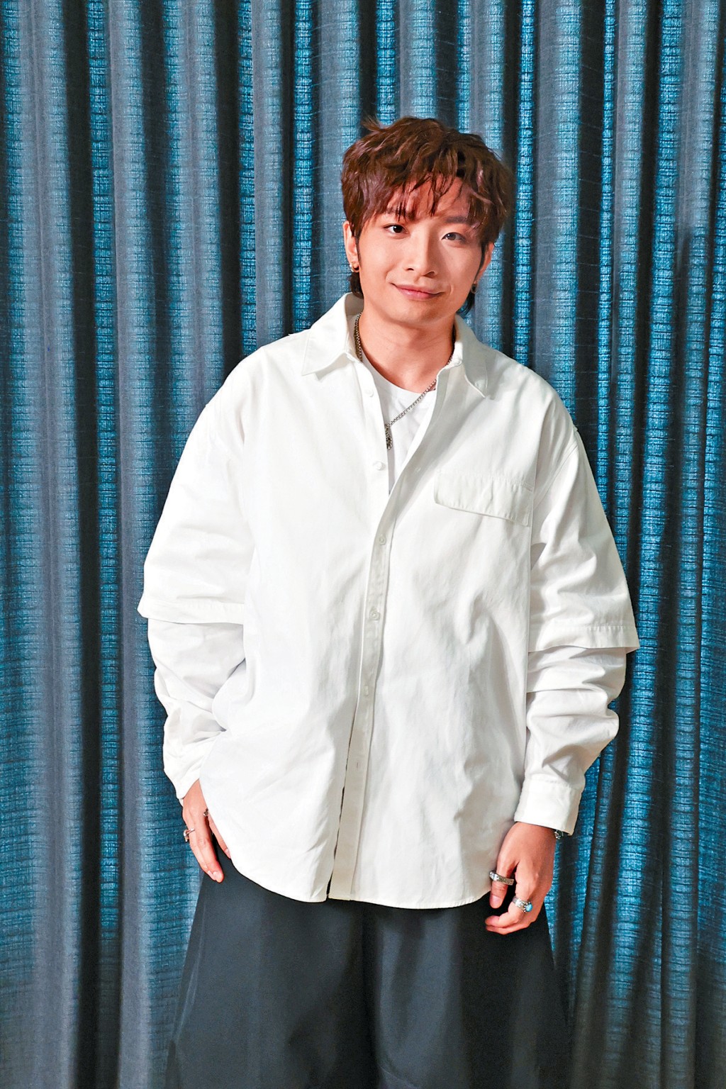 何啟華對大環境比較保守，覺得現在留現金在身比較穩陣。