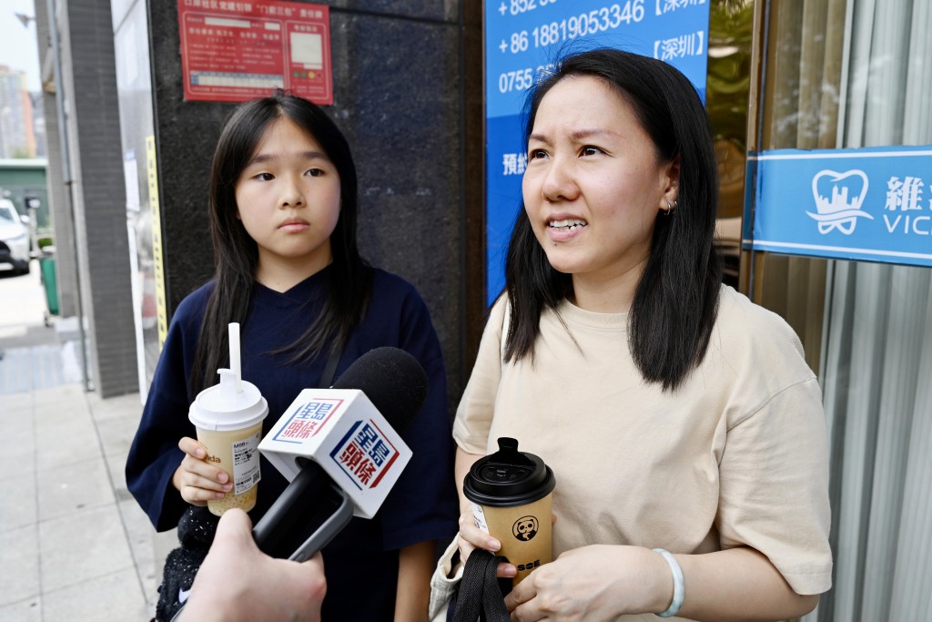 香港市民陸小姐攜女兒赴深圳箍牙,相信新口岸過關便利港人。 劉駿軒攝 香港市民陸小姐攜女兒赴深圳箍牙,相信新口岸過關便利港人。 劉駿軒攝