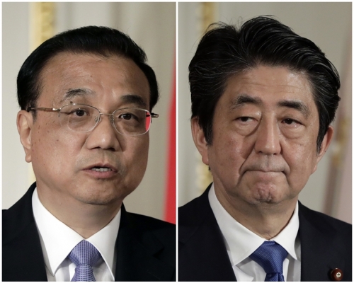 李克強(左)與安倍晉三舉行會談。AP
