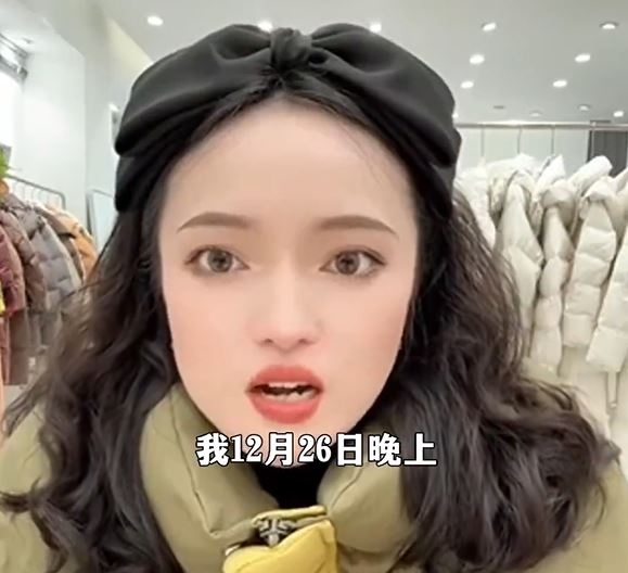 女商人楊寧拍片實名舉報，中國郵政寄失捐贈到甘肅的羽絨服。影片截圖