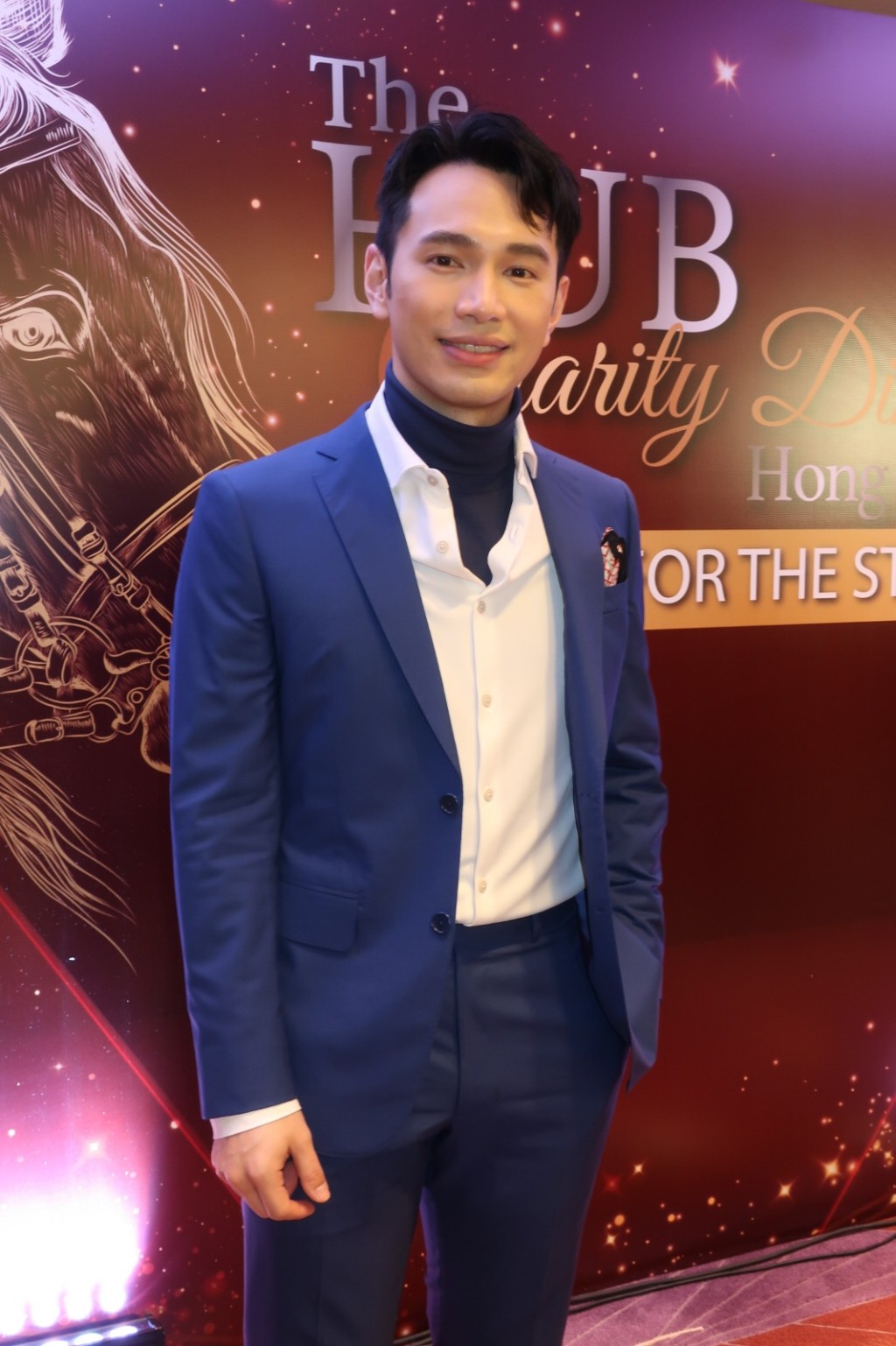 王梓軒指會義務教導小朋友音樂創作。