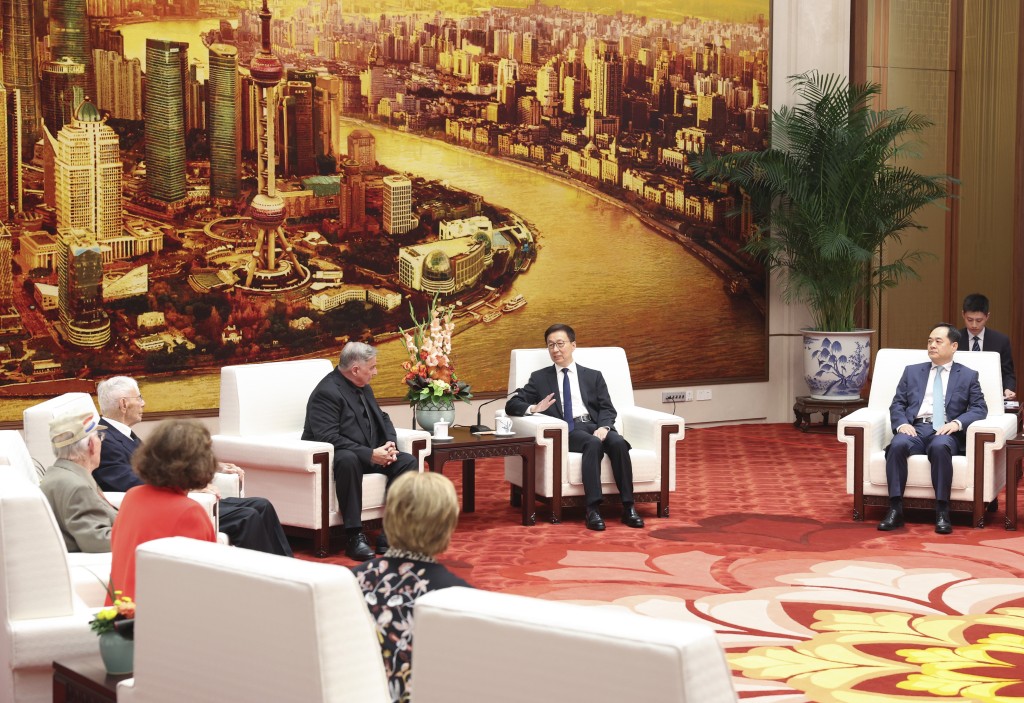 國家副主席韓正在北京會見了飛虎隊代表團成員。新華社