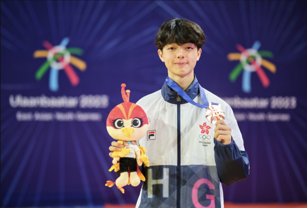 金梓軒在東亞青年運動會男子48公斤比賽中摘下銅牌。