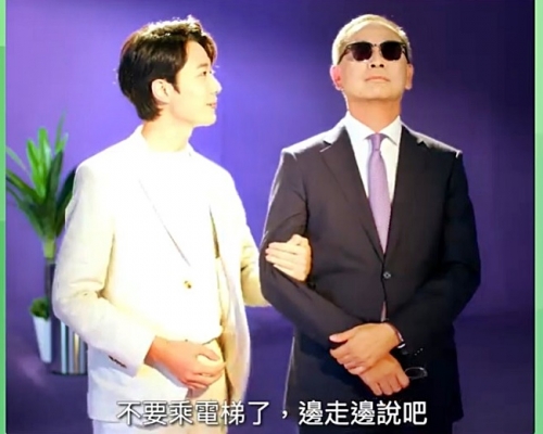 金管局總裁余偉文在片中做返自己「老細」角色。影片截圖