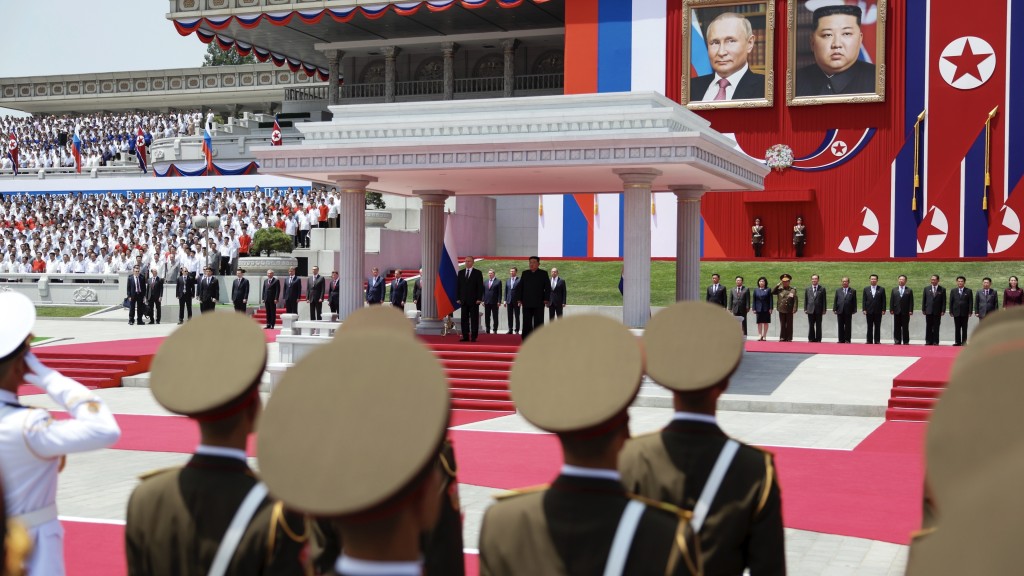 金正恩为普京举行欢迎仪式。 美联社