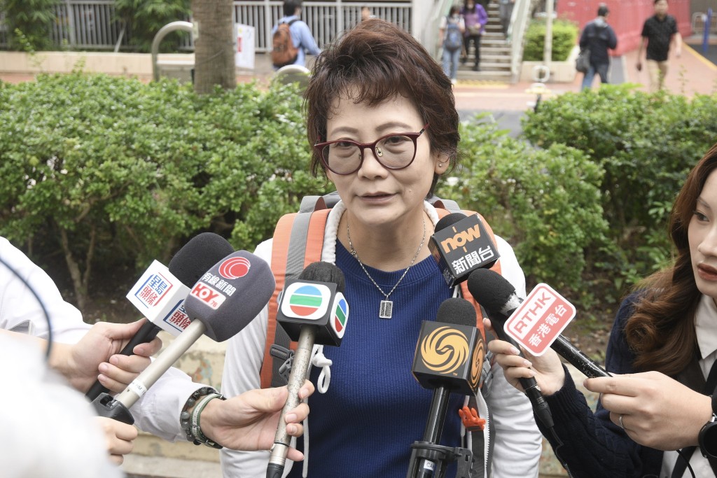 溫女士指自己有做開運動，對走上25樓有信心。