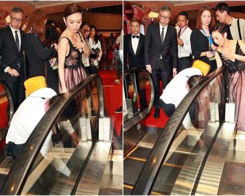 周家怡被扶手電梯「食裙」。