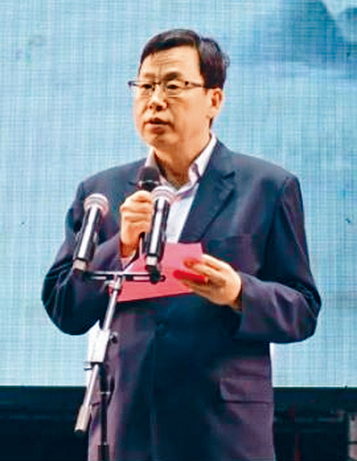 被指打人的商務局局長常志卷。