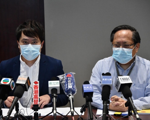 鄺俊宇(左)及何俊仁(右)。
