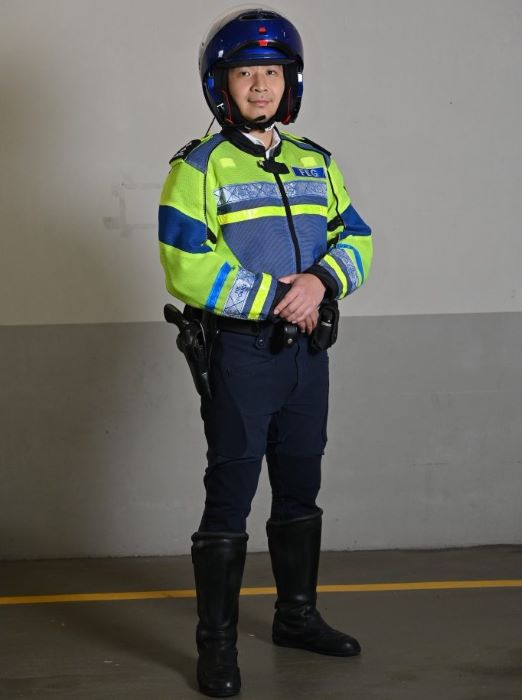 警队护送组采用蓝色头盔，有别于一般交通警员的白色头盔，以作辨识。