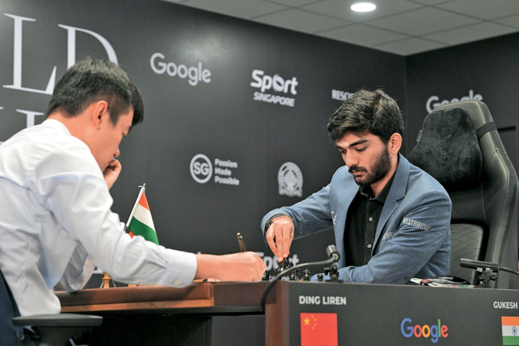 印度國際象棋手多曼拉朱周四與中國好手丁立人對決。