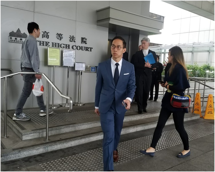 羅鷹瑞兒子羅俊禮今到庭旁聽。黃梓生攝
