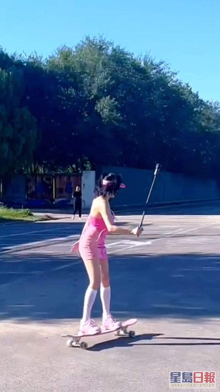 鍾麗緹再以螢光粉紅造型拍踩滑板影片，網民反應兩極。