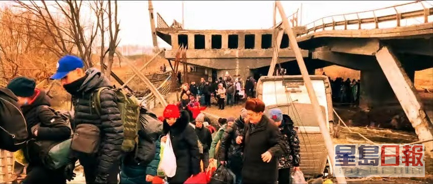 MV中出現烏克蘭人民逃離家園的傷感鏡頭。