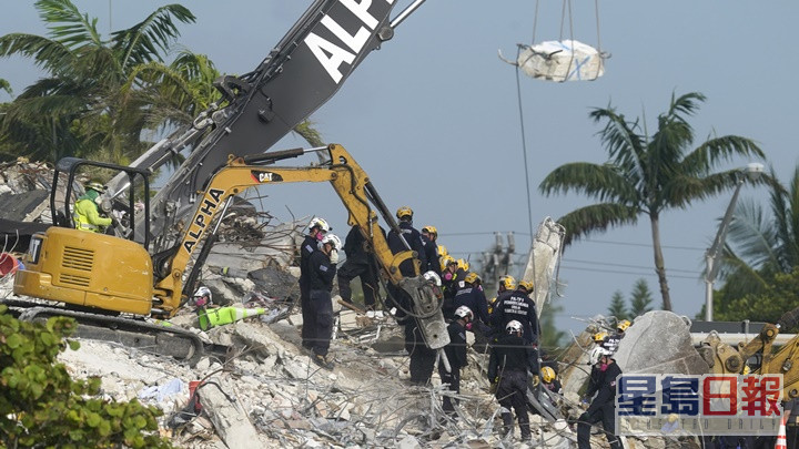 救援人员在事发后一个月方寻回最后一名罹难者遗体。AP图片