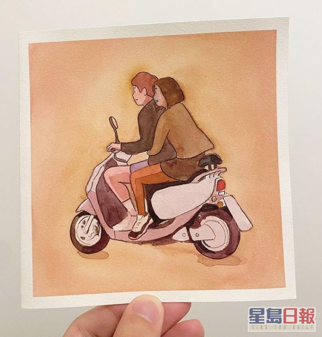 還貼出一男一女坐電單車的卡通圖片。