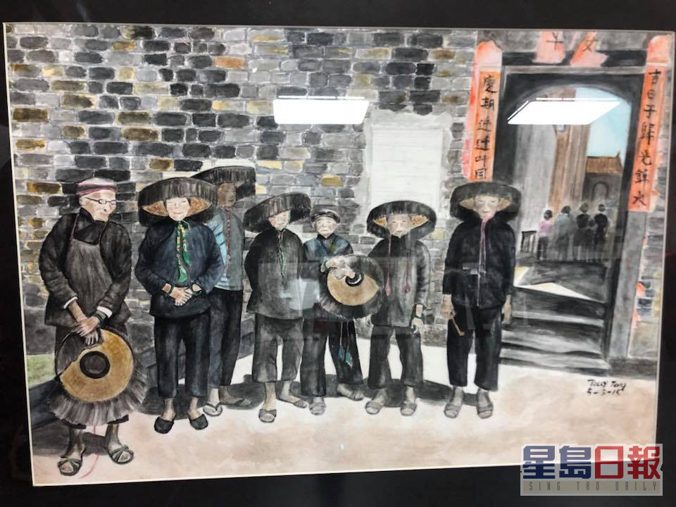 邓锦群的画作记录了围村的人与事。