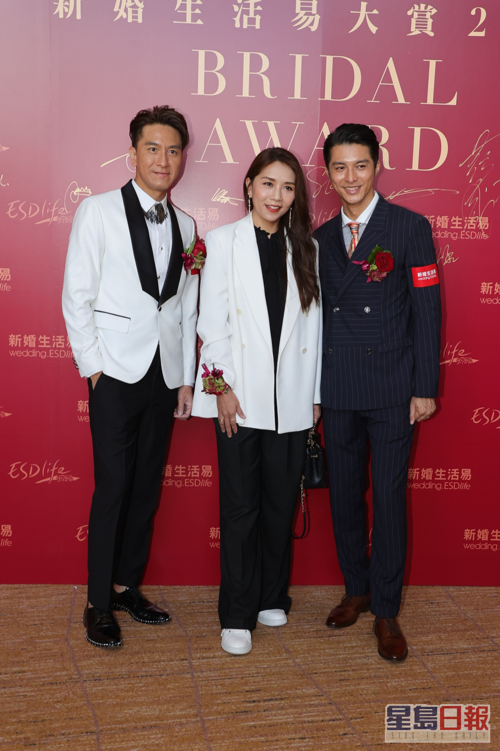 馬國明、黃嘉樂和太太江惠賢出席婚禮主題的頒獎活動。