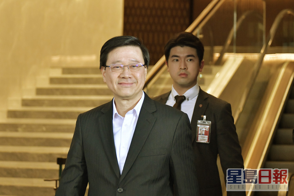 李家超3月6日由北京返抵香港。資料圖片