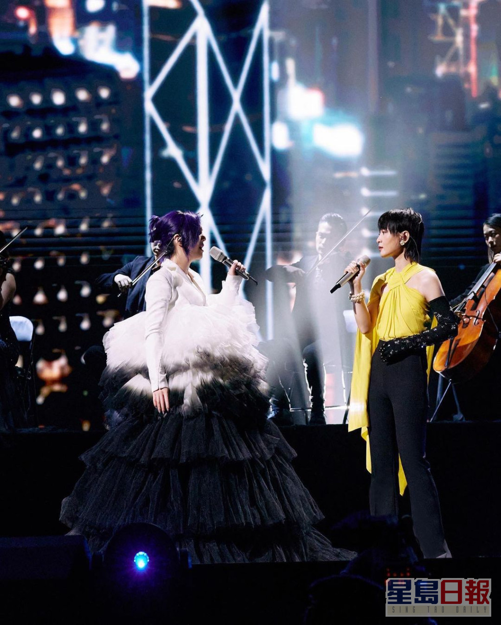 李太认为杨千嬅是广东歌的重要代表，因此想让学生到场欣赏好听的广东歌。
