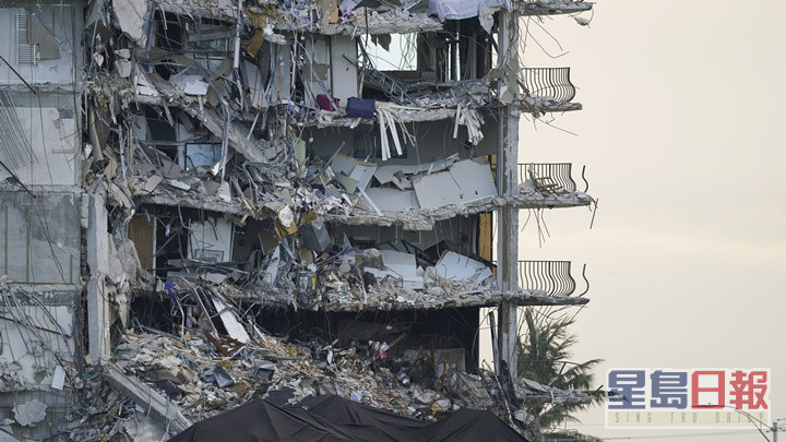 当局对塌楼惨刻的调查初步发现，当局并没有及时疏散大厦住客。AP资料图片
