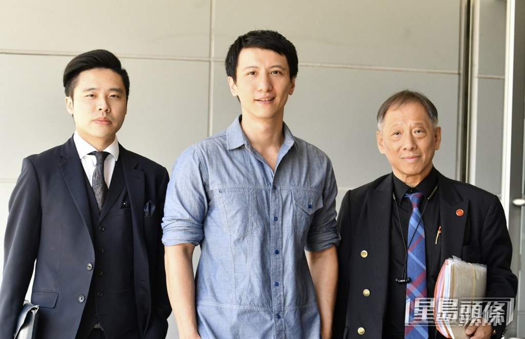 常子謙大律師(左)、周永恒(中)今日現身法庭。 禇樂琪攝 