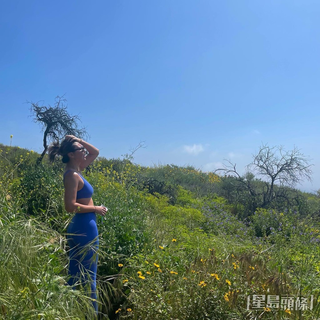 王丽嘉穿上运动装行山。