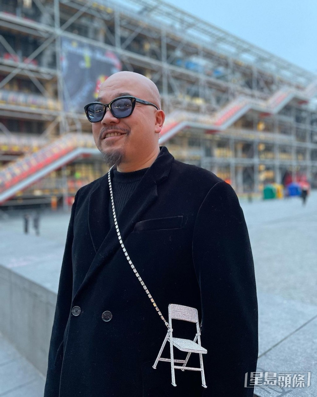黄伟文的光头Look已成招牌。