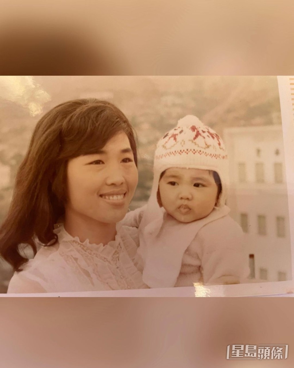 似十足妈咪。