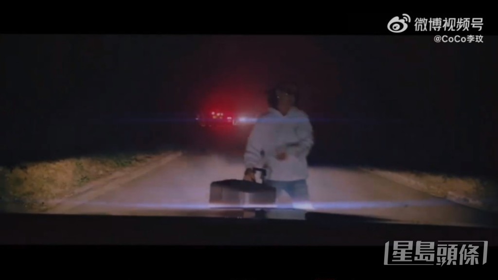 新歌預告片中，李玟拖著行李箱步上車。