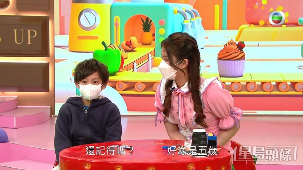原來兩個小男孩是伍文生都兩個囝囝。