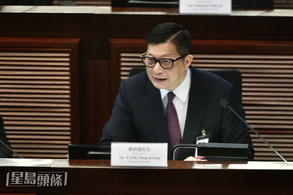 邓炳强。卢江球摄