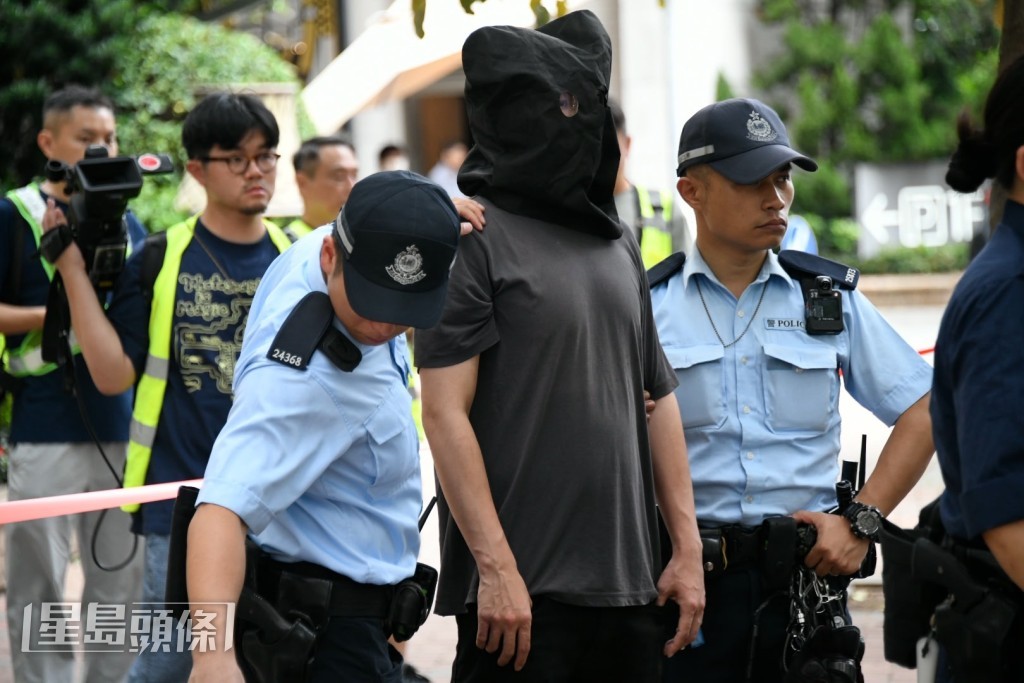 男司機涉案被捕。楊偉亨攝 男司機涉案被捕。楊偉亨攝