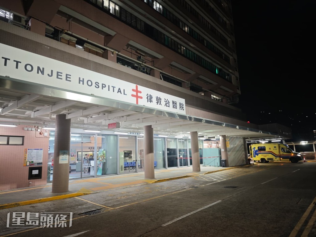 女子昏迷被送往律敦治醫院治理。黎志偉攝 女子昏迷被送往律敦治醫院治理。黎志偉攝