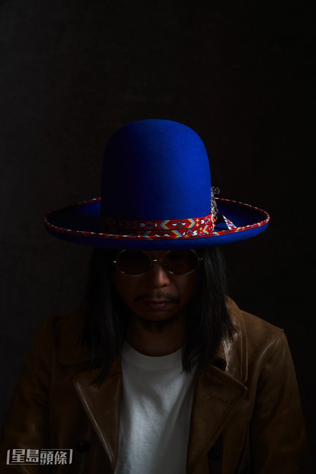 王雙駿說每頂帽都有不同的音樂故事。