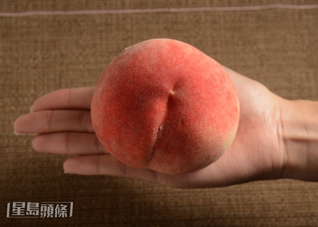 宜選重手的桃子。