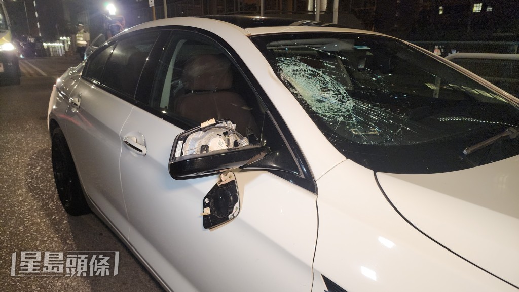 私家車側鏡及擋風玻璃損毀。黎志偉攝 私家車側鏡及擋風玻璃損毀。黎志偉攝