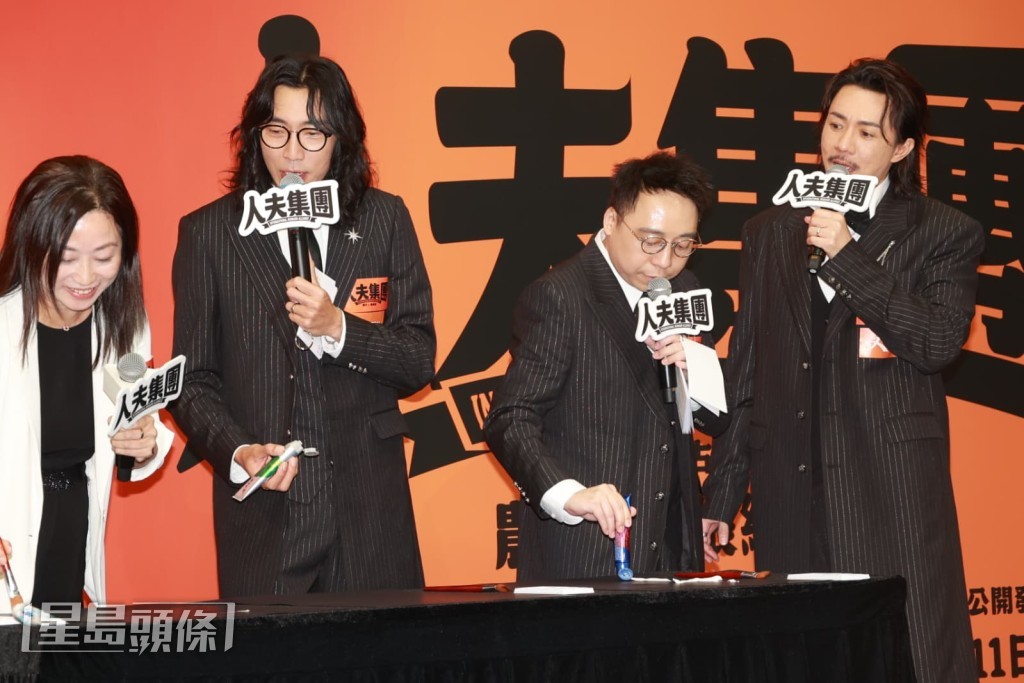 農夫與張繼聰執筆揮毫。 農夫與張繼聰執筆揮毫。