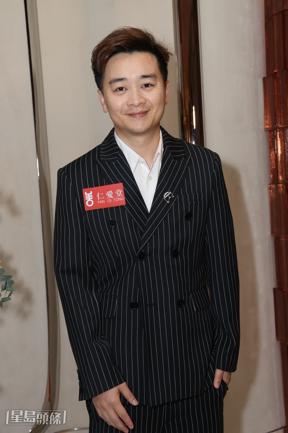 譚輝智今晚到金鐘出席慈善晚宴。 譚輝智今晚到金鐘出席慈善晚宴。