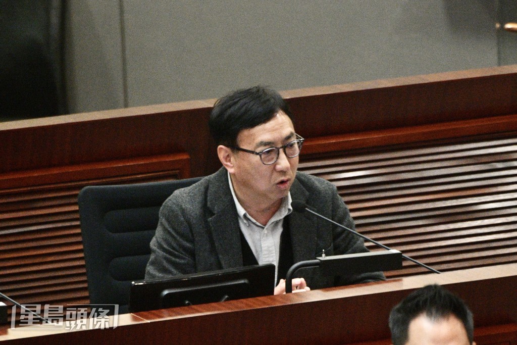 狄志远。卢江球摄