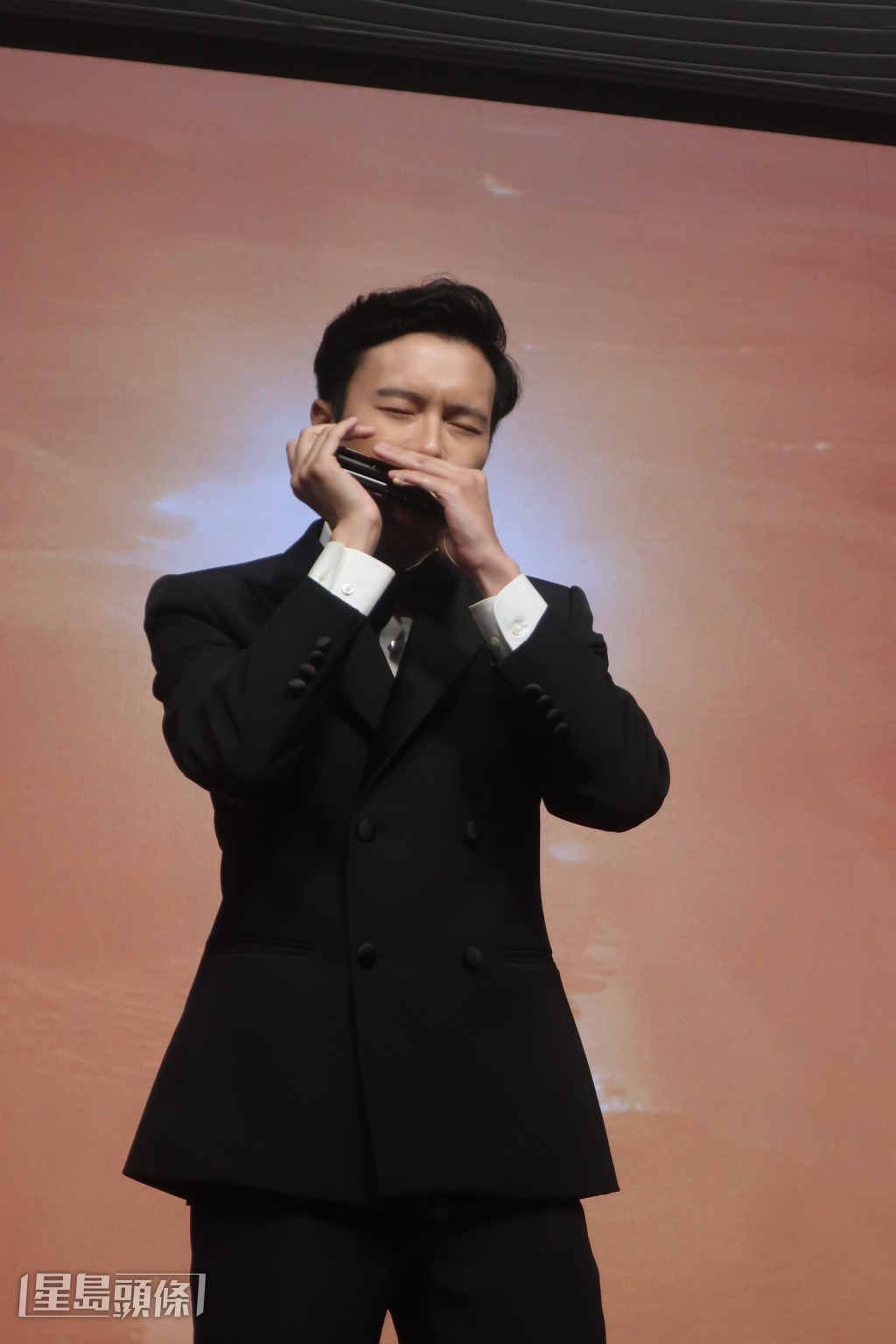 世界口琴冠軍李俊樂的精彩演奏，同樣獲得全場嘉賓熱烈掌聲。