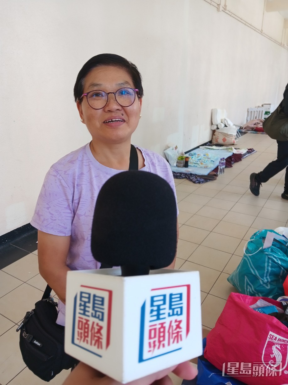 居民謝太太。曾智華攝 居民謝太太。曾智華攝