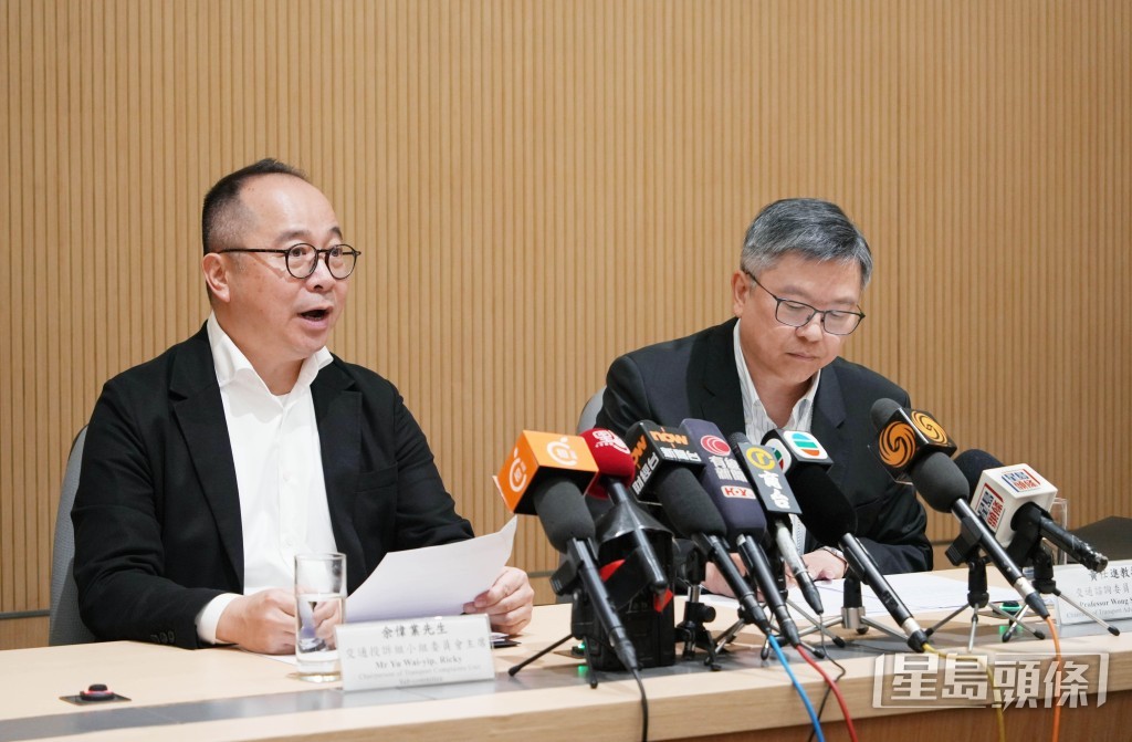交通諮詢委員會委員余偉業（左）、主席黃仕進（右）。