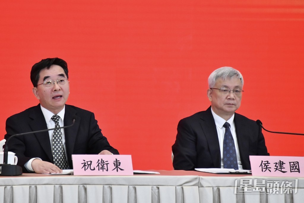 左起:中央宣講團成員祝衛東、侯建國。 左起:中央宣講團成員祝衛東、侯建國。