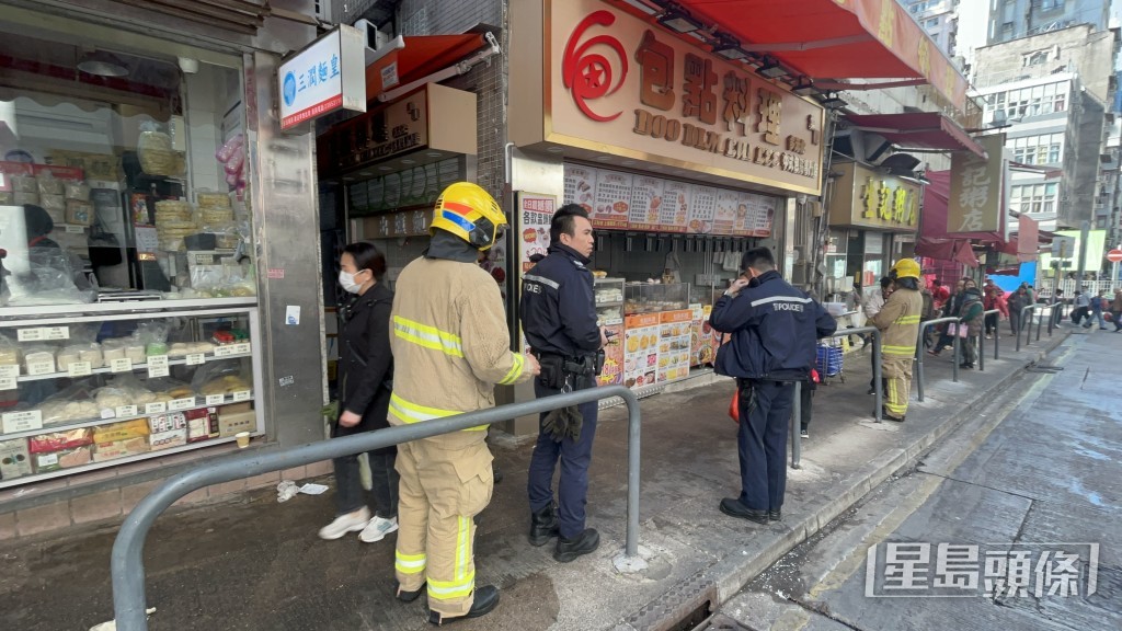 消防到場救熄火警。楊偉亨攝 消防到場救熄火警。楊偉亨攝