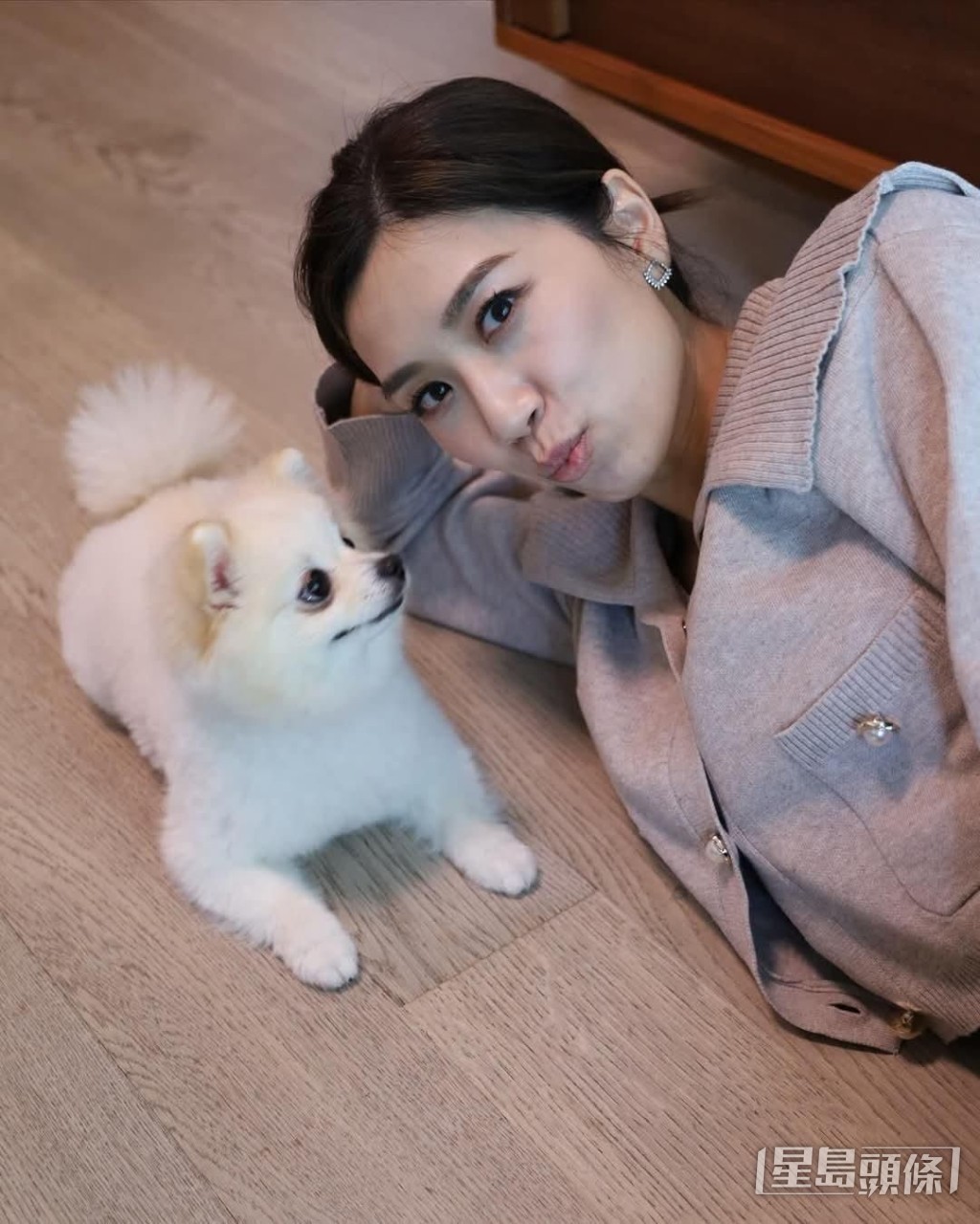 黄智雯视爱犬为主人。